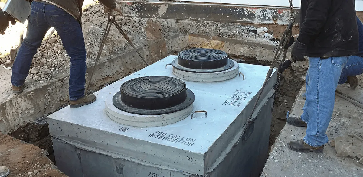 Grease trap installation for a commercial property drainage system in Milwaukee, WI
